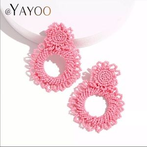Statement baby pink earrings